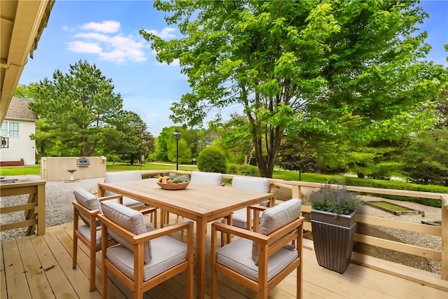 12 Luncarty Ln, Bella Vista, AR 72715 - wooden deck with outdoor dining space