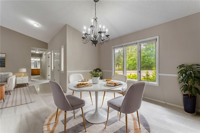 12 Luncarty Ln, Bella Vista, AR 72715 - dining space featuring lofted ceiling and a chandelier