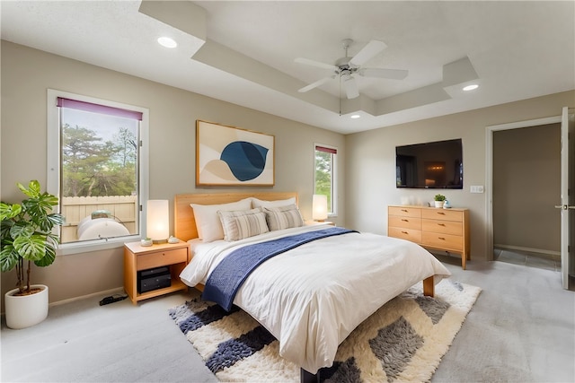 12 Luncarty Ln, Bella Vista, AR 72715 - bedroom with light colored carpet, a raised ceiling, recessed lighting, and ceiling fan