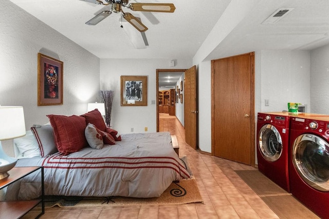 16180 Black Oak Ln, Rogers, AR 72756 - bedroom featuring washer and dryer and ceiling fan