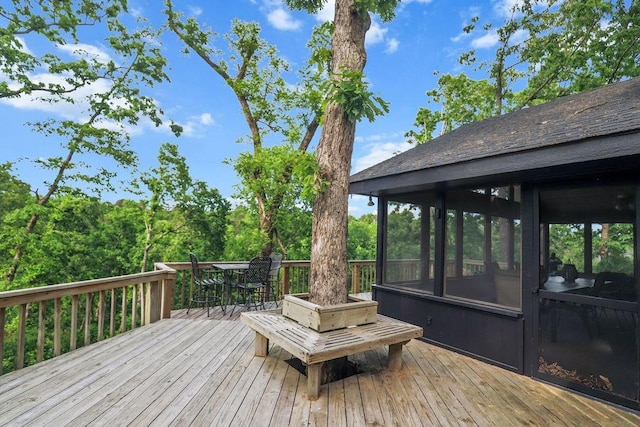 16180 Black Oak Ln, Rogers, AR 72756 - deck featuring a sunroom and outdoor dining space