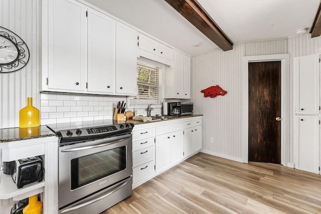 9211 Larue Rd, Rogers, AR 72756 - kitchen with electric range, white cabinets, and beam ceiling