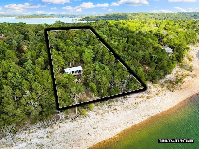 9211 Larue Rd, Rogers, AR 72756 - aerial view of property's location featuring a heavily wooded area, a large body of water, and property boundaries highlighted