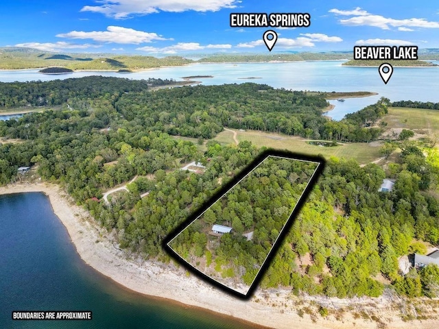 9211 Larue Rd, Rogers, AR 72756 - view of property location with a nearby body of water, a forest, and property boundaries highlighted