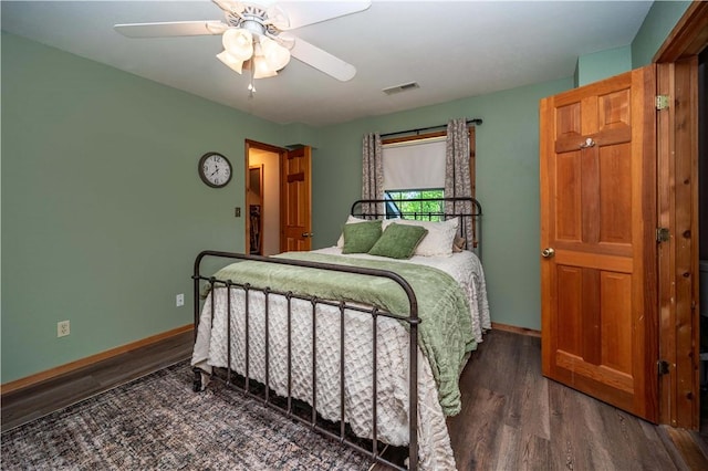 398 Northfork Dr, Berryville, AR 72616 - bedroom with wood finished floors, baseboards, and ceiling fan