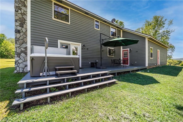 398 Northfork Dr, Berryville, AR 72616 - rear view of property with a covered hot tub, a deck, and a yard