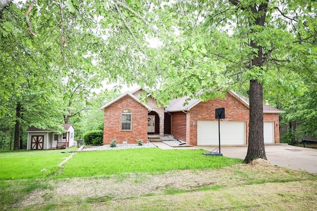 view of front of home with a garage, brick siding, concrete driveway, and a front lawn