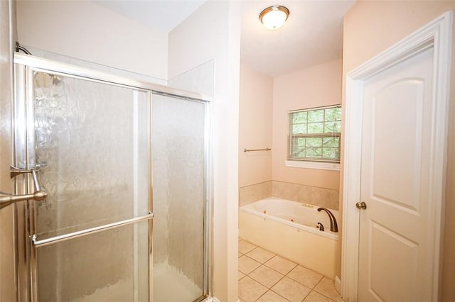 full bath with a bath, a stall shower, and tile patterned floors
