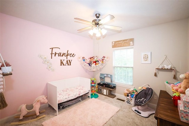 bedroom featuring carpet flooring, baseboards, and a ceiling fan