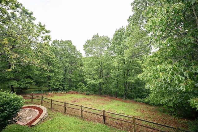 view of yard featuring a wooded view