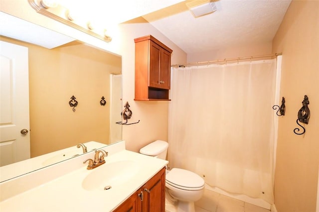 full bathroom featuring toilet, vanity, curtained shower, and tile patterned floors