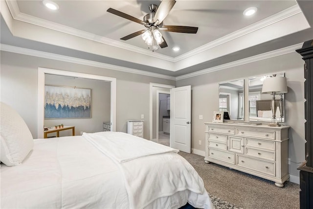 bedroom featuring a raised ceiling, carpet flooring, recessed lighting, ceiling fan, and baseboards