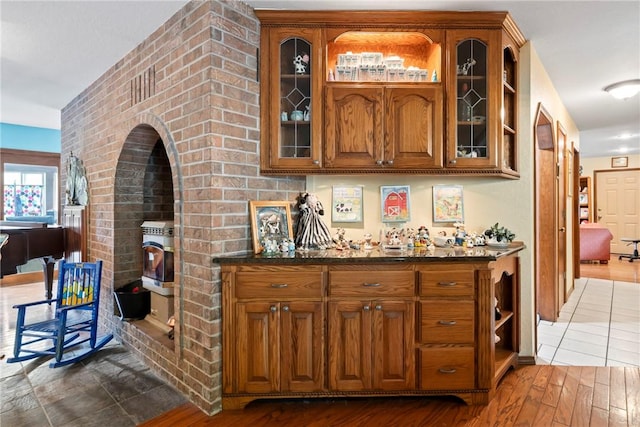 30 Brittany Ln, Bella Vista, AR 72714 - indoor dry bar featuring wood-type flooring and arched walkways