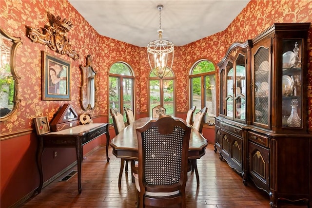 30 Brittany Ln, Bella Vista, AR 72714 - dining space with wallpapered walls, dark wood finished floors, a chandelier, and baseboards