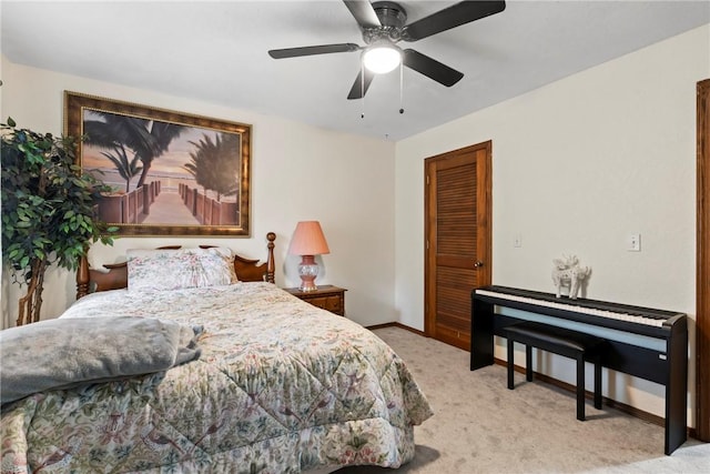 30 Brittany Ln, Bella Vista, AR 72714 - bedroom featuring light colored carpet, baseboards, a ceiling fan, and a closet