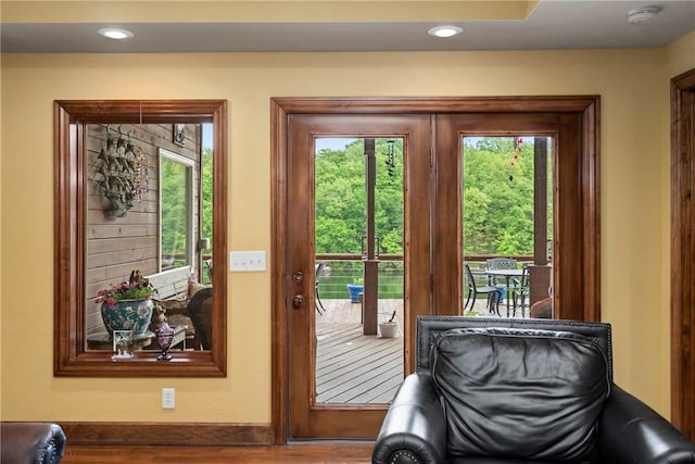 30 Brittany Ln, Bella Vista, AR 72714 - doorway featuring healthy amount of natural light, recessed lighting, wood finished floors, and baseboards