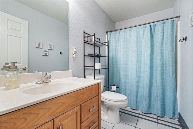 22058 Dogwood Cir, Springdale, AR 72764 - bathroom with a textured wall, tile patterned floors, toilet, vanity, and a shower with curtain