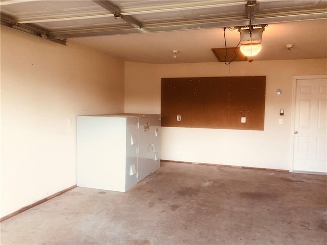 garage with baseboards