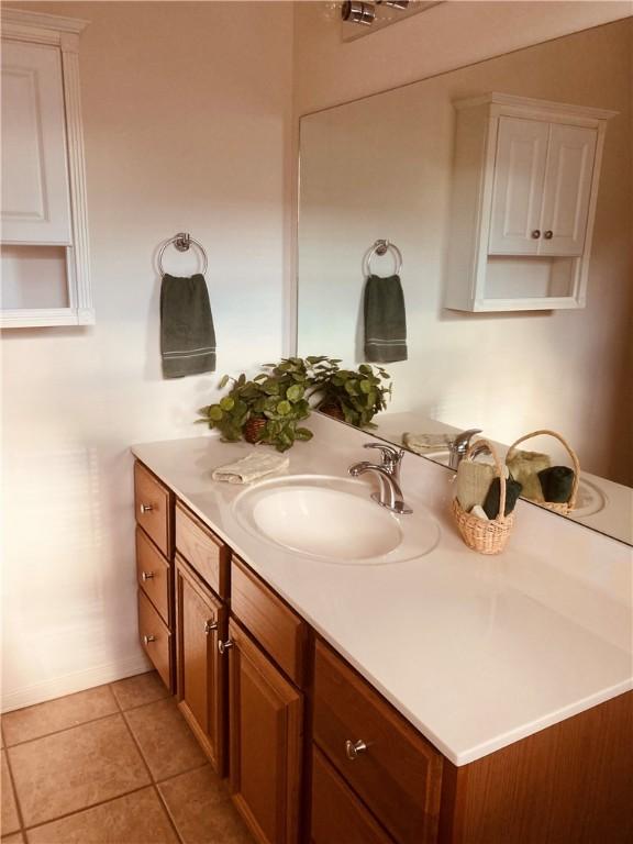 bathroom featuring vanity and tile patterned floors