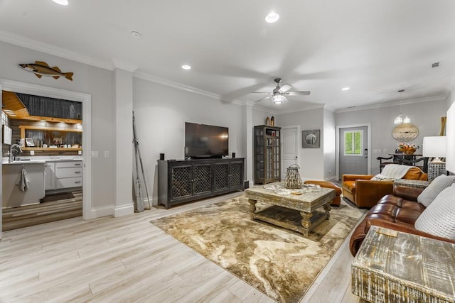 103 County Road 1522, Eureka Springs, AR 72632 - living room featuring a ceiling fan, light wood finished floors, recessed lighting, and crown molding