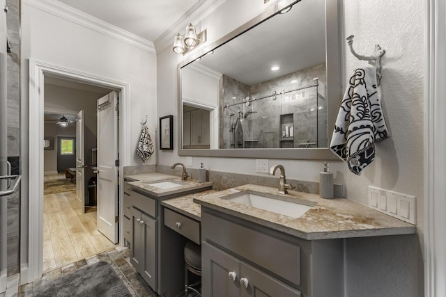103 County Road 1522, Eureka Springs, AR 72632 - bathroom featuring double vanity, ornamental molding, a stall shower, and a ceiling fan