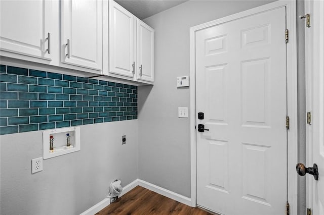 laundry area with hookup for an electric dryer, cabinet space, baseboards, dark wood-style floors, and hookup for a washing machine