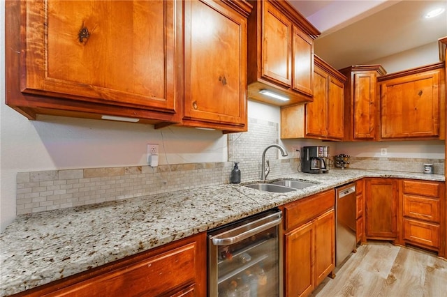 9696 Fuller Rd, Rogers, AR 72756 - kitchen featuring a sink, beverage cooler, decorative backsplash, light wood-type flooring, and brown cabinets