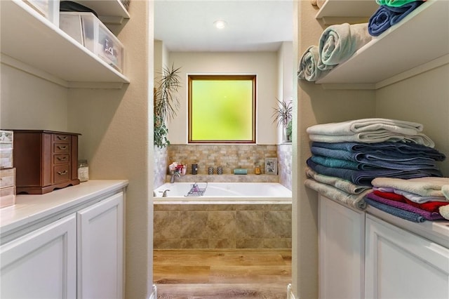 9696 Fuller Rd, Rogers, AR 72756 - full bath with a bath and wood finished floors