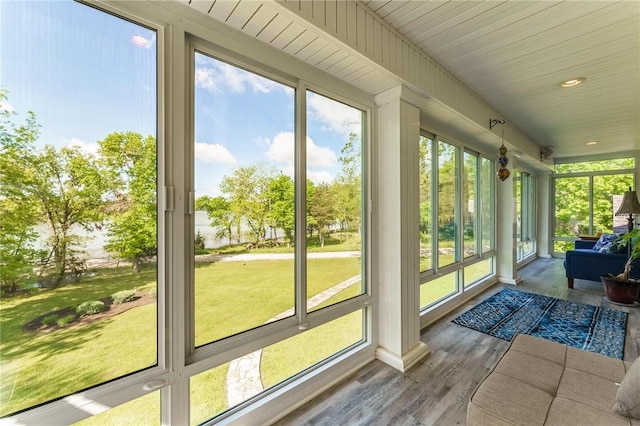 9696 Fuller Rd, Rogers, AR 72756 - sunroom with plenty of natural light and wood finished floors
