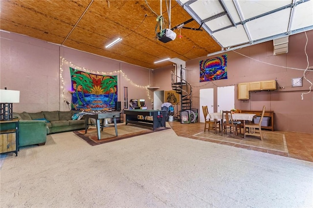 9696 Fuller Rd, Rogers, AR 72756 - living room with speckled floor and a garage
