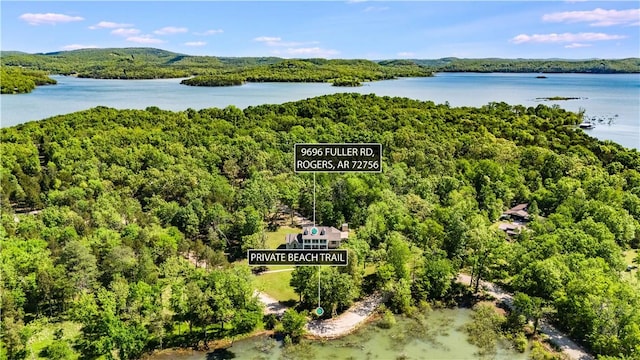 9696 Fuller Rd, Rogers, AR 72756 - aerial view of a heavily wooded area and a large body of water