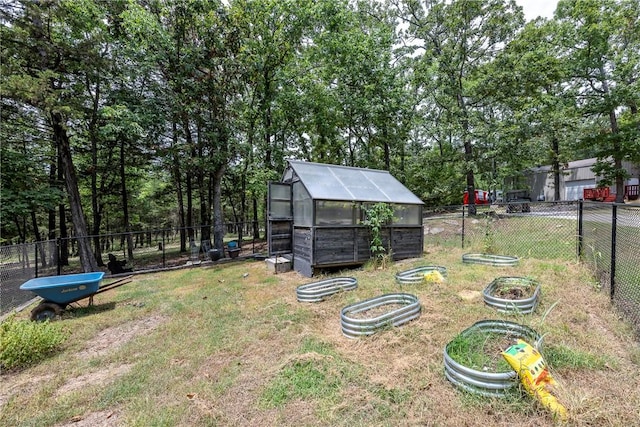 9696 Fuller Rd, Rogers, AR 72756 - view of yard with a greenhouse, a garden, and an outdoor structure