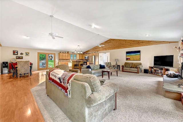 17155 Deer Park Ln, Pea Ridge, AR 72751 - living room featuring vaulted ceiling, a ceiling fan, and light wood finished floors