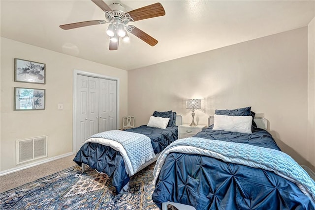 17155 Deer Park Ln, Pea Ridge, AR 72751 - carpeted bedroom featuring ceiling fan, a closet, and baseboards