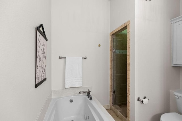2636 Everest Ave, Rogers, AR 72758 - bathroom with a shower stall, a bath, and toilet