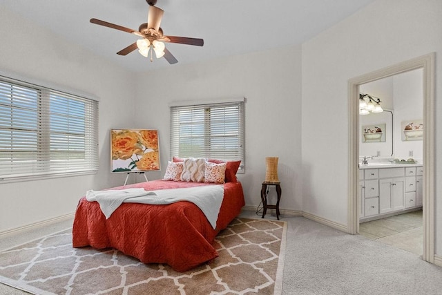 2636 Everest Ave, Rogers, AR 72758 - bedroom featuring multiple windows, light carpet, a sink, and baseboards