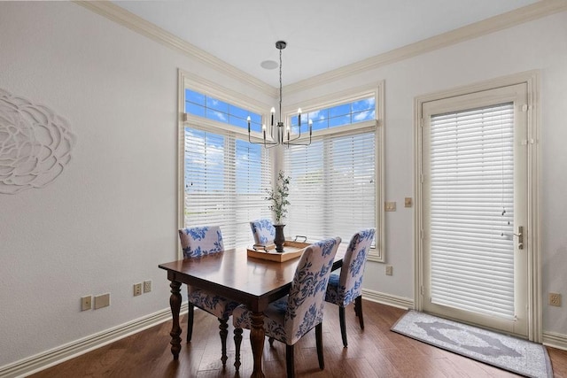 2636 Everest Ave, Rogers, AR 72758 - dining room featuring dark wood finished floors, baseboards, a chandelier, and ornamental molding