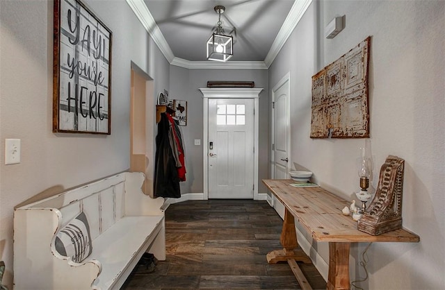 entryway with ornamental molding and dark wood-style floors