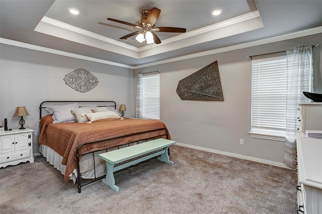 bedroom with a raised ceiling, light carpet, crown molding, a ceiling fan, and recessed lighting
