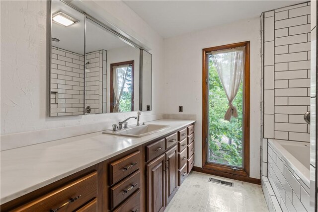 13 Rancho Vista Ln, Holiday Island, AR 72631 - kitchen featuring a sink, healthy amount of natural light, and light countertops