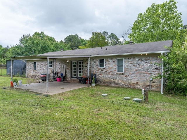 1503 Bugscuffle, Lavaca, AR 72941 - rear view of property with a patio area, a yard, and brick siding