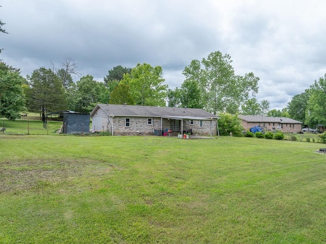 1503 Bugscuffle, Lavaca, AR 72941 - view of front of home featuring a patio area and a front yard