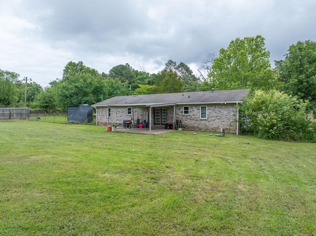 1503 Bugscuffle, Lavaca, AR 72941 - back of house with a patio and brick siding