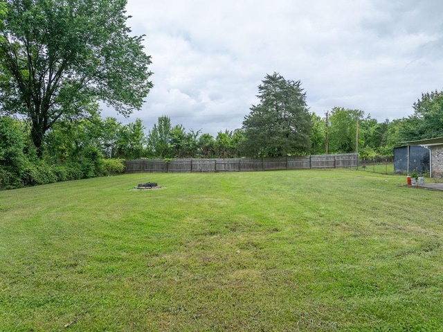 1503 Bugscuffle, Lavaca, AR 72941 - view of yard with an outdoor fire pit