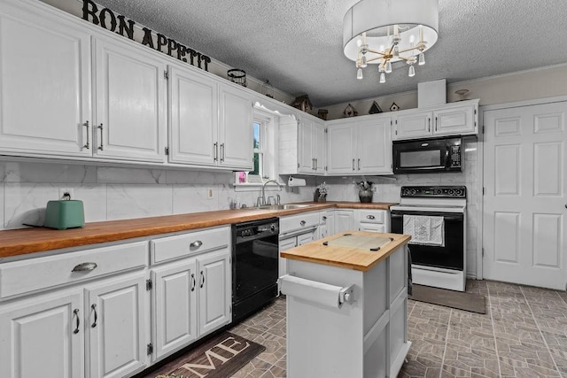 1503 Bugscuffle, Lavaca, AR 72941 - kitchen featuring wooden counters, black appliances, a sink, white cabinetry, and backsplash