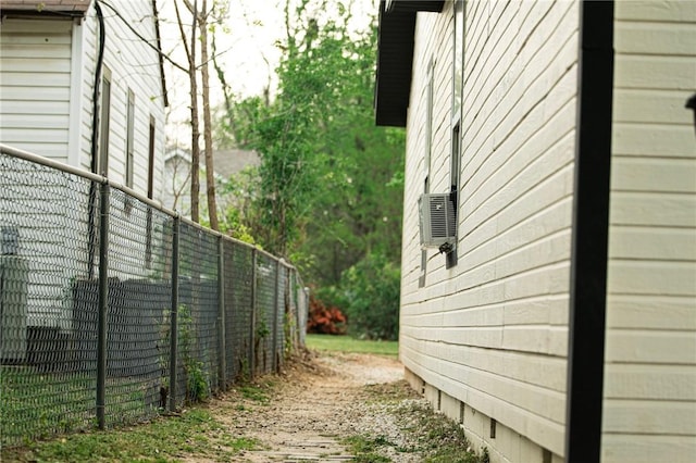 view of side of property with fence