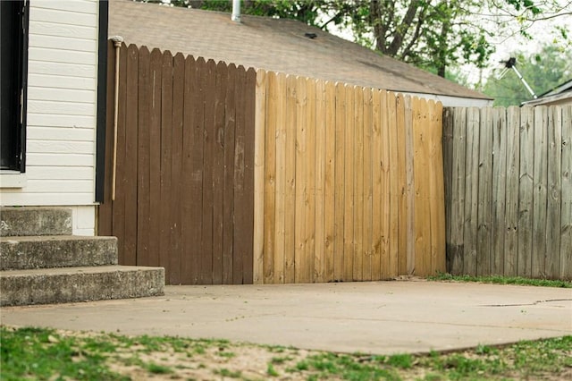 view of outdoor structure featuring fence