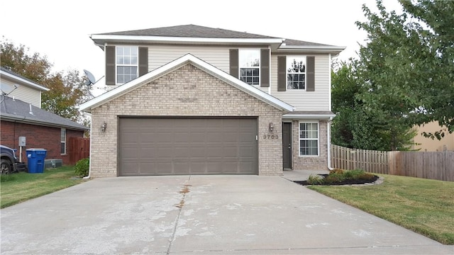 3703 Hansom Loop, Bentonville, AR 72712 - traditional-style home with driveway, brick siding, and an attached garage