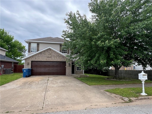 3703 Hansom Loop, Bentonville, AR 72712 - view of front facade with brick siding, concrete driveway, an attached garage, and central air condition unit