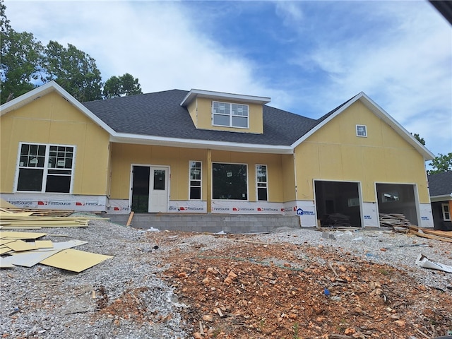 37 Selkirk Dr, Bella Vista, AR 72715 - unfinished property with roof with shingles and covered porch